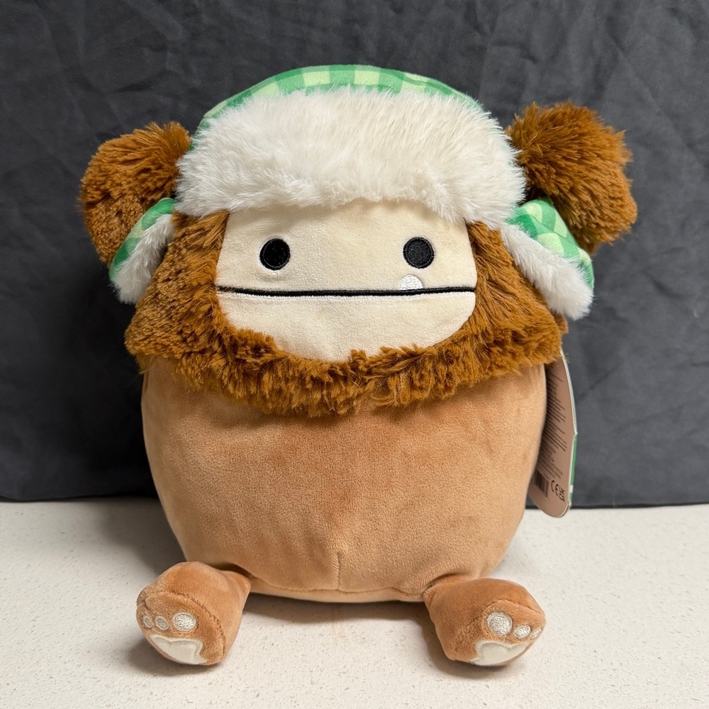 NWT Squishmallows 8” Benny Bigfoot Brown Winter Green Trapper Hat Holiday 2023